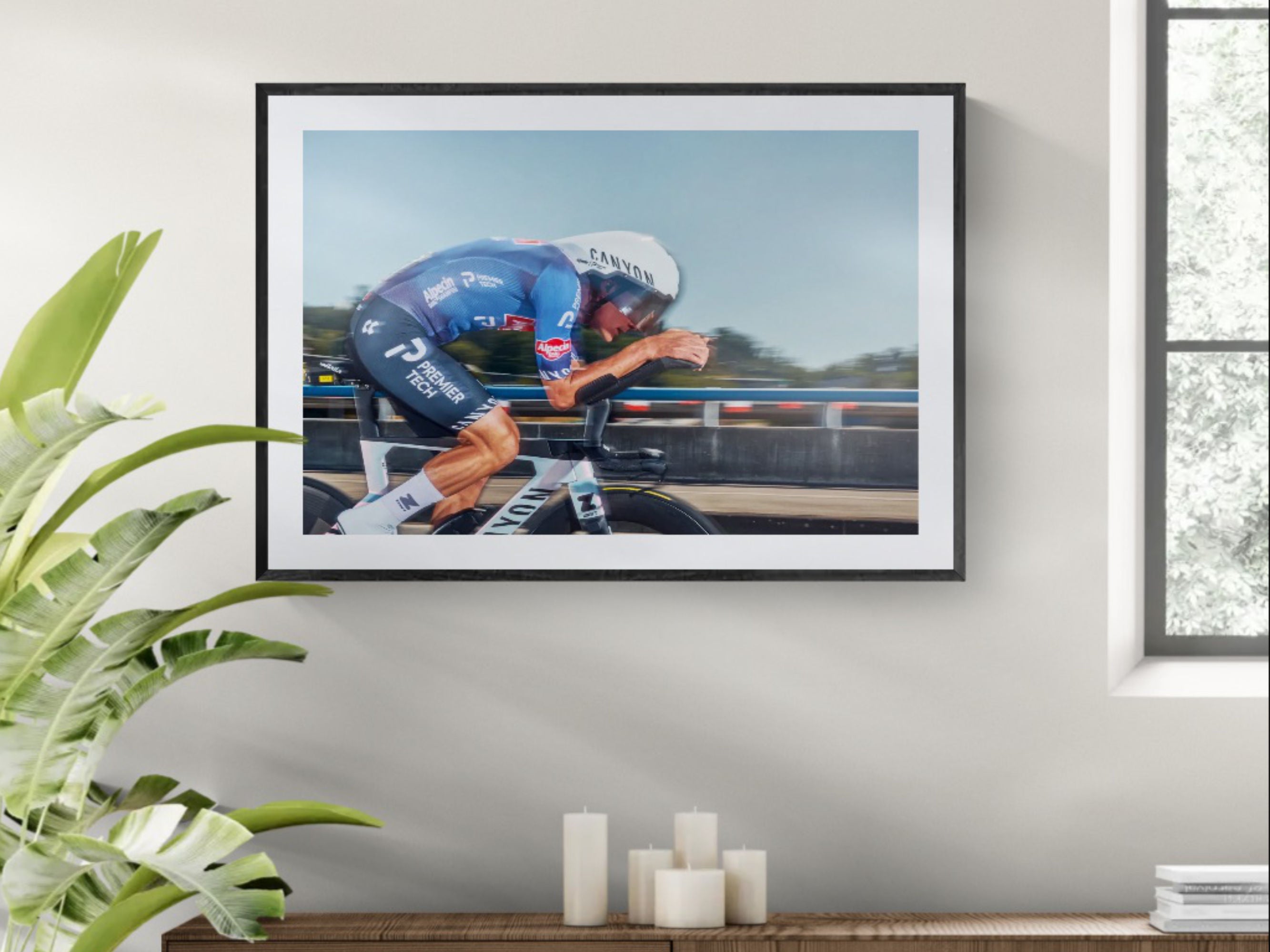 MVDP Tour de France time trial print framed on wall with plants