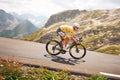 Tadej Pogačar descending Col du Galibier in yellow jersey, Tour de France 2026