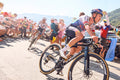 Remco Evenepoel climbing through crowds on Alpe d'Huez, Tour de France 2026 Stage 19