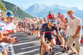 Julian Alaphilippe climbing through crowds on Alpe d'Huez, Tour de France 2026
