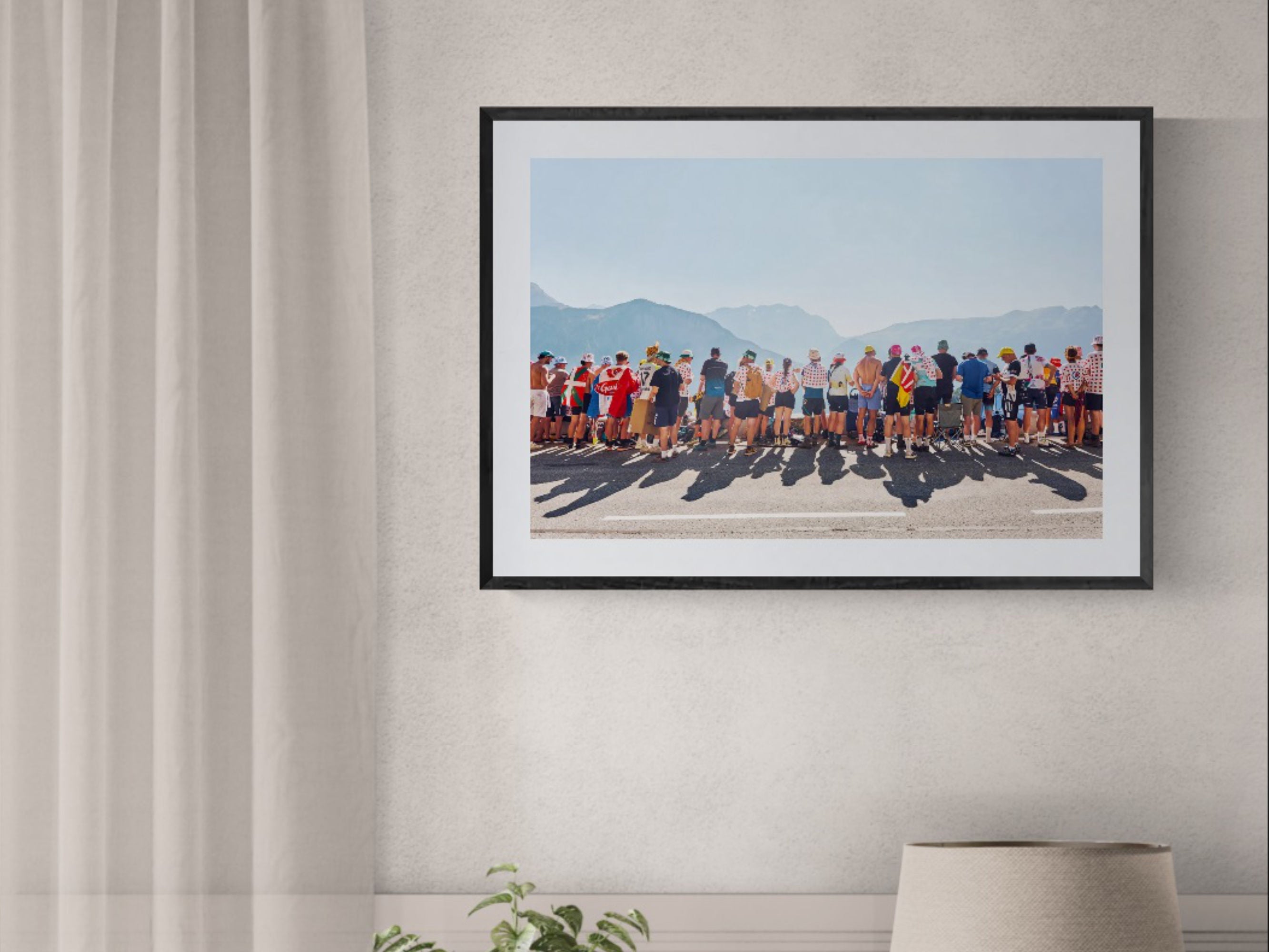 Tour de France Alpe d'Huez crowd print framed on wall near curtains